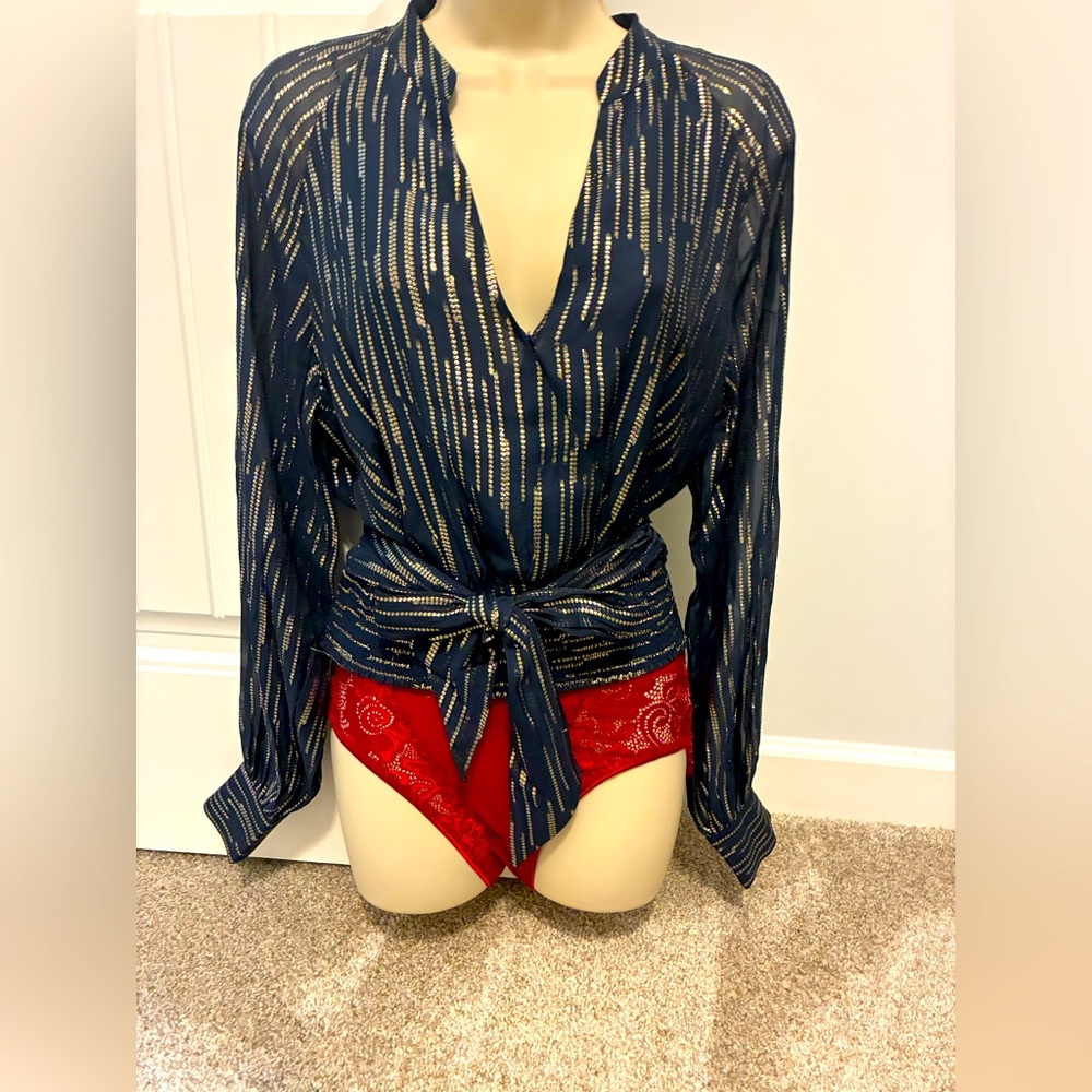 Stylish Black and Gold Blouse by White House Black Market.